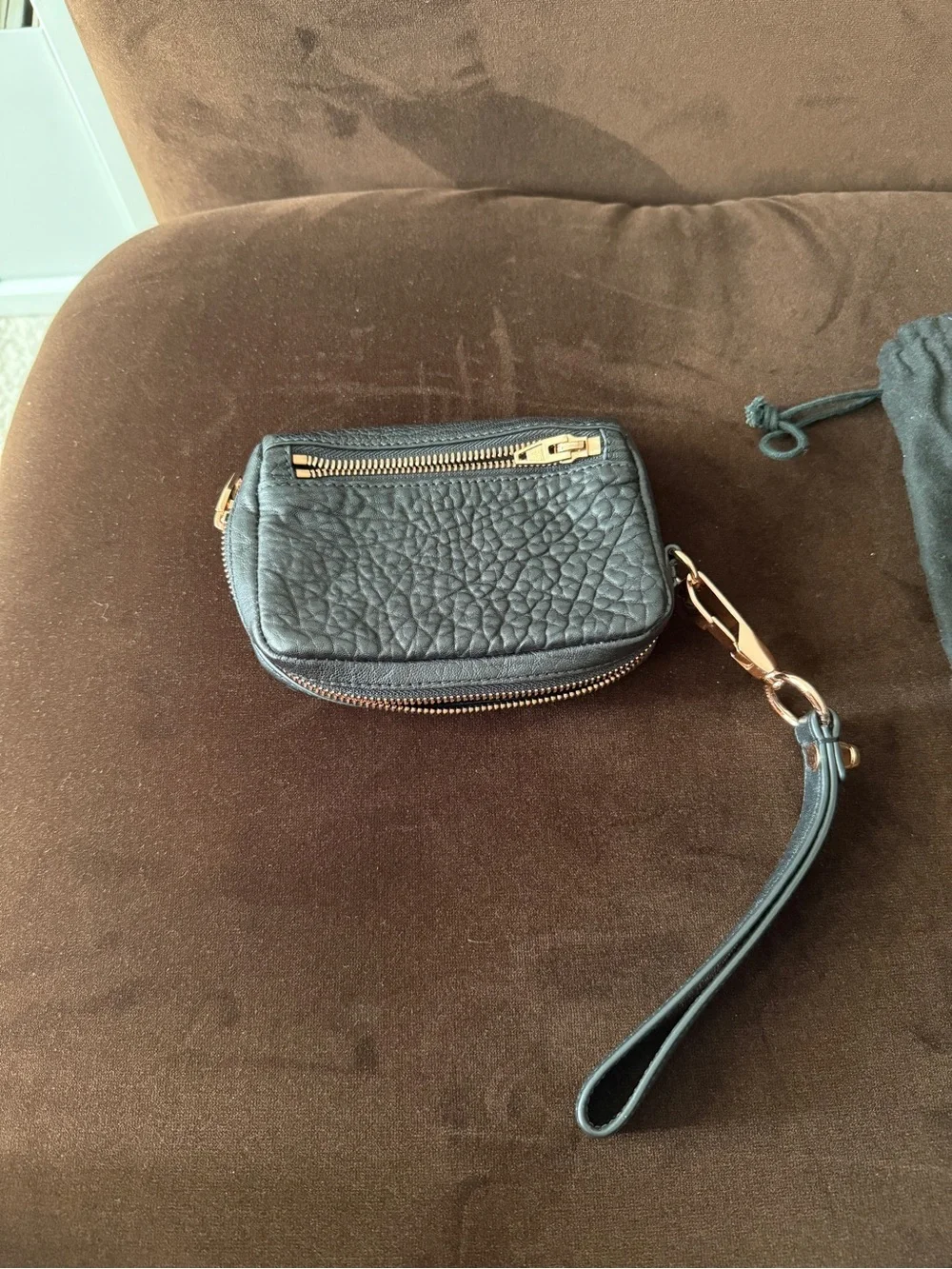 Alexander Wang pebbled fumo leather wristlet rose gold